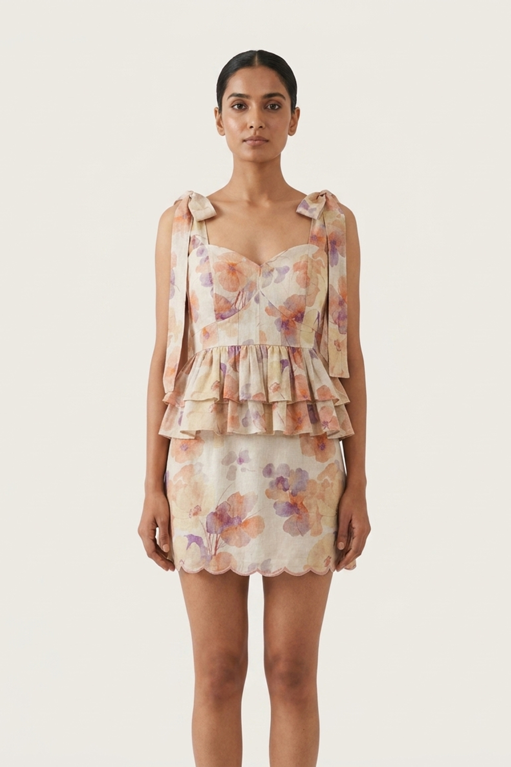 CAPRI PEPLUM TOP AND SHORT SKIRT
